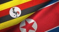 Uganda and North Korea two flags textile cloth, fabric texture