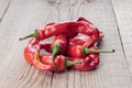 Ugly Chili pepper on a gray wooden background. Selective focus