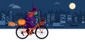 Ugly evil witch riding a bicycle Royalty Free Stock Photo