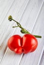 Ugly fruit or vegetable. Severely malformed mutant tomato. Food shops mostly prefer the best quality fruit and vegetables. Ugly Royalty Free Stock Photo