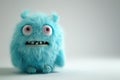 Ugly monster with a tired and depressed expression, fabulous creature made by hand from blue plasticine. Scary face of Royalty Free Stock Photo