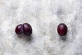 Ugly and normal plums. Abnormal organic fruit Royalty Free Stock Photo