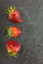 Ugly organic strawberries isolated on white background