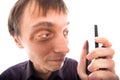 Ugly weirdo man looking at cellphone