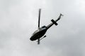 UH-1H Iroquois helicopter flying in the air. Huey taking off on maneuvers during army exercise. EUFOR in Bosnia and Herzegovina du