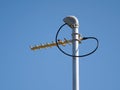 UHF radio antenna on pole against blue sky landscape format Royalty Free Stock Photo