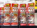 Uhu poly max adhesive display in german hardware store aisle Royalty Free Stock Photo