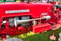 Engine and classic chrome horn of a vintage McCormick D423 tractor