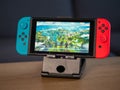UK - Feb 2020:Nintendo switch games console with Fortnite game on screen Royalty Free Stock Photo