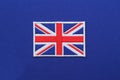 Uk flag patch on fabric Royalty Free Stock Photo