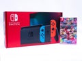 UK, Jan 2020: Nintendo switch games console box and mario kart bundle white background