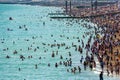 UK June 29th, 2019 Brighton beach, Brighton and Hove, East Sussex, England. Thousands of people relax on the sun Royalty Free Stock Photo