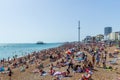 UK June 29th, 2019 Brighton beach, Brighton and Hove, East Sussex, England. Thousands of people relax on the sun Royalty Free Stock Photo