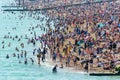 UK June 29th, 2019 Brighton beach, Brighton and Hove, East Sussex, England. Thousands of people relax on the sun Royalty Free Stock Photo