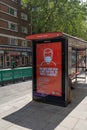 UK, London, 16/6/2020 - A London bus shelter electronic bill board advertising that all passengers must wear a face mask