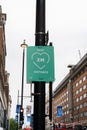 UK, London, 3/6/2020 - A please keep your distance sign on a lamp post on Oxford Street, London, UK