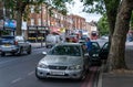 Two drivers exchanging insurance details after a car collision in London Royalty Free Stock Photo