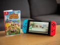 UK, March 2020: Nintendo switch animal crossing game opener on screen