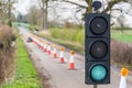 UK Motorway Roadworks Green Traffic Lights Cones Royalty Free Stock Photo