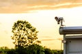 Uk motorway traffic monitor camera at sunset