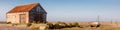 UK, Norfolk, Thornham, Old Harbour, 2109, April, 22: Coal Barn and old boat at Thornham, panorami