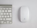 UK, October 2019: Apple mac wireless mouse and keyboard on white background Royalty Free Stock Photo