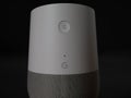 UK, October 2019: Google Home smart speaker in dark environment