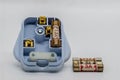 A UK plug with 3 different rated fuses