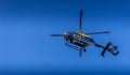 Police Helicopter in blue sky