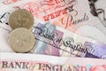 UK Pounds Currency Banknotes and Coins. Royalty Free Stock Photo
