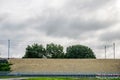 Uk railroad on gravel hill over cloudy background in england uk Royalty Free Stock Photo