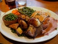 All served with a selection of seasonal vegetables, Yorkshire puddings, mac & cheese and beef dripping or plain roasties