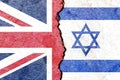 UK vs Israel flags on cracked wall, political conflict concept Royalty Free Stock Photo