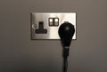 UK wall electric plug socket (brushed silver) Royalty Free Stock Photo