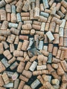 10.10.2020. Ukanc, Slovenia. Background of many vintage wine corks on the table in restaurant. Top view. Party and holiday concep