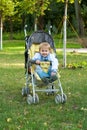 Ukrain boy in the national clothes sitting in a stroller Royalty Free Stock Photo