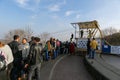 Ukrainain crowd watching people ziplining