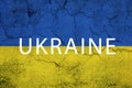 Ukrainain flag on a textured wall, national idendity, war crisis between Ukraine and Russia, political issue Royalty Free Stock Photo
