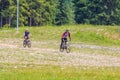 Ukraine, Carpathians, Bukovel. August 2019. Cyclists at workout on the downhill_