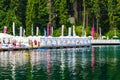 Ukraine, Carpathians, Bukovel. August 2019. People rest on the lake_