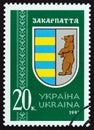 UKRAINE - CIRCA 1997: A stamp printed in Ukraine shows Arms of Zakarpattia oblast, circa 1997.