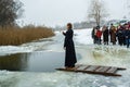 Ukraine, the city of Romny, January 19, 2013: the feast of the Baptism of the Lord. The Orthodox rite of bathing in a pit.