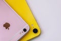 22.08.2019 Ukraine: Closeup yellow iphone xr and pink iphone 6s on isolated background