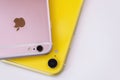 22.08.2019 Ukraine: Closeup yellow iphone xr and pink iphone 6s on isolated background