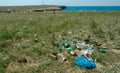 UKRAINE, CRIMEA - AUGUST 02, 2009: Pollution of the steppe nature with plastic household waste