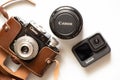 Ukraine Dnepr 21.02.2022 - Canon EF 50 mm 1 8 lens and GoPro Hero 9 Black Action Camera and old camera change of Royalty Free Stock Photo