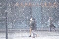 Ukraine Dnipro 03.21.2021 - city dwellers walk down the street in heavy snow, mitel in the city