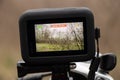 Ukraine Dnipro 20.04.201 - GoPro HERO 9 Black on a bicycle in the forest in spring, shooting on an action camera from a Royalty Free Stock Photo