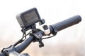 Ukraine Dnipro 30.03.2021 - GoPro HERO 9 on the handlebars of a bicycle on a bike ride in the park Royalty Free Stock Photo