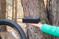 Ukraine Dnipro 05.04.2021 - a red electric bike is recharged in a forest in a park, new technologies